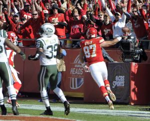 Chiefs tight end Travis Kelce celebrates after scoring his only touchdown of the game. Kelce is an emerging star.